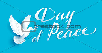 Day of Peace lettering text for greeting card. White dove with branch symbol of peace