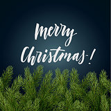 Modern christmas calligraphy on a dark background with spruce branches. Vector illustration.