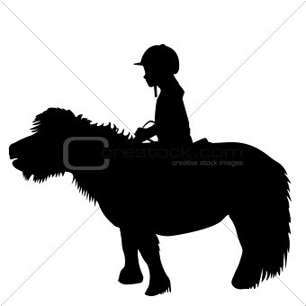 Kid riding a pony