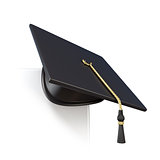 Graduation cap on blank board corner. 3D