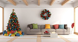 White living room with christmas tree