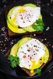 Toasts with avocado and poached eggs