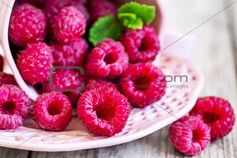 Raspberry in cup