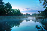 Morning fog on a calm river