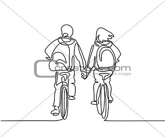 Boy and girl bicycling to school