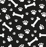 Dog bones seamless pattern. Bone and traces of puppy paws repetitive texture. Doggy endless background. Vector illustration.