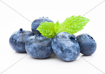 Fresh healthy organic blueberry with mint leaf