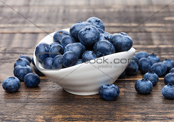 Fresh healthy organic blueberry in white bowl