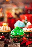 Set of different delicious Christmas cupcakes