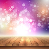 Wooden table looking out to bokeh lights background 