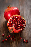 Pomegranate fruit on wooden vintage background