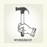 Hand with hammer - repair service emblem