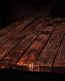 Dark wood table, brown wooden background