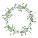 Christmas wreath with branches and mistletoe