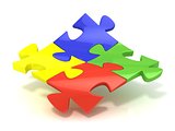 Four colorful jigsaw puzzle pieces banded