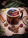 mulled wine in a brown ceramic cup 
