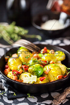 Roasted brussels sprouts with bacon and sun dried tomato