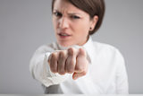 focus on a punch of an angry woman