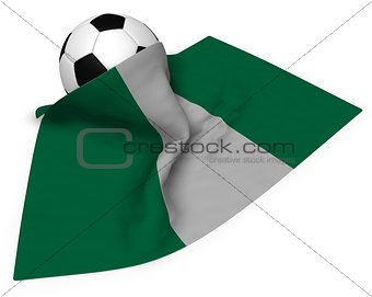 soccer ball and flag of nigeria - 3d rendering