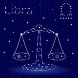 Zodiac sign Libra with snowflakes
