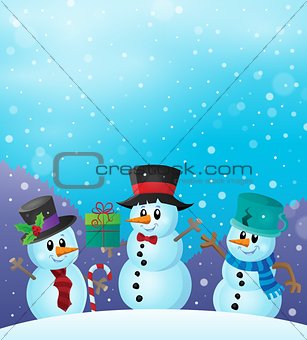 Christmas snowmen in snowy weather