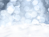Christmas background with bokeh lights and snow