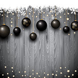 Christmas baubles on a wooden texture background
