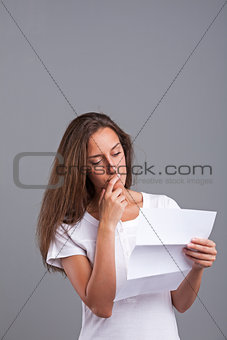 woman thinking about that letter