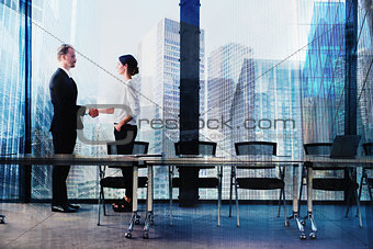 Handshake of two businessperson in office concept of partnership and teamwork