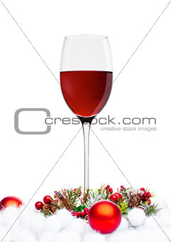 Red wine glasses with christmas decoration