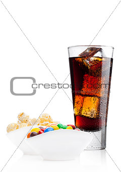 Round  coated sweet candies with cola and popcorn