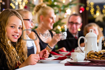Family having traditional Christmas coffee time