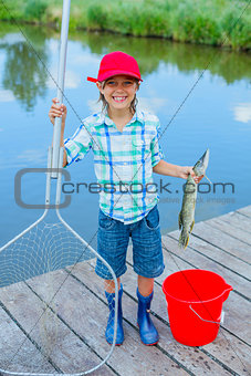 Cute boy enjoyed the fishing
