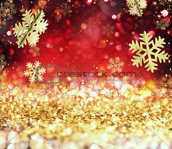 Abstract glowing Christmas gold and red background with snowflakes
