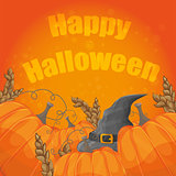 Modern Halloween card with old hat and pumpkins on orange background