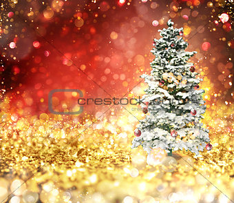 Christmas tree on a gold and red sparkly background