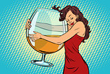 woman hugging a glass of wine