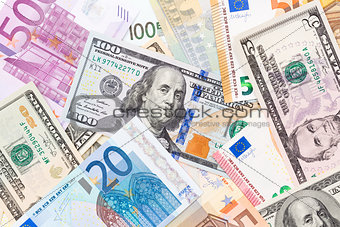 Background made of euros and dollars.