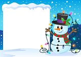 Snowy frame with Christmas snowman 2