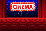 Realistic cinema hall interior with red seats. Retro style cinema sign with spot light frame. Movie premiere poster design. Vector illustration.