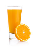 Glass of fresh orange juice with fruit bits