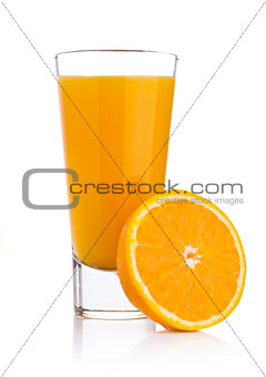 Glass of fresh orange juice with fruit bits