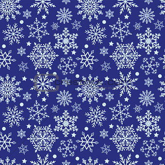 Snowflakes on blue background seamless texture