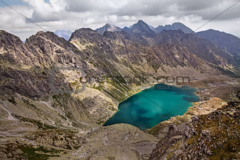 Beautiful lake Hlincovo Pleso among rocky Tatra mountains