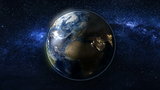 Planet Earth in black and blue Universe of stars