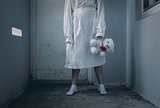 mentally ill girl with straitjacket in a Psychiatric
