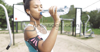 Girl drinking after workout