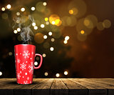 3D mug on a wooden table looking out to a defocussed Christmas t