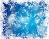 Christmas bokeh lights background with snowy border