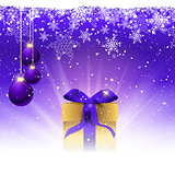 Christmas gift with purple ribbon nestled in snow